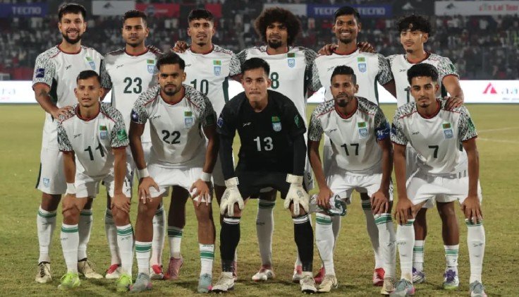 Bangladesh Beat India After 22 Years in a Historic Victory Bangladesh created history by defeating India after a long wait of 22 years in the Asian Cup qualifiers. On Monday night at the packed National Stadium, the men in red and green displayed discipline, confidence, and fighting spirit. The early lead they secured in the 11th minute ultimately sealed the long-awaited win. India dominated possession in the opening minutes, but it was Bangladesh who found the breakthrough. In the 11th minute, Rakib Hossain delivered a well-measured pass from the left, which Sheikh Morsalin calmly finished. It was his seventh goal for the national team—and the moment that set the tone for a historic night. The match heated up in the 34th minute when Bangladesh’s Topu Barman and India’s Vikram clashed, leading to a brief scuffle. The referee showed both players yellow cards. Earlier, a defensive mistake nearly put Bangladesh in danger, but Hamza Choudhury came to the rescue with a crucial headed clearance inside the box. Just before halftime, Hamza’s powerful long-range effort narrowly missed the target, denying Bangladesh a chance to double the lead. Bangladesh went into the break 1–0 ahead. India came out attacking in the second half, creating a few half-chances. However, strong defensive performances from Sad Uddin, Topu Barman and substitute Shakil Ahad kept India at bay. Despite dominating ball possession, India failed to level the score. A major moment of controversy came in the 83rd minute when the ball appeared to strike an Indian defender’s hand inside the box. Bangladesh strongly appealed for a penalty, but the referee dismissed the claim. Still, Bangladesh maintained control and composure. Coach later introduced Shahriyar Emon and Taj Uddin to strengthen the midfield and defense in the final moments. In added time, Bangladesh denied India any real chance of scoring and held firm until the final whistle. As the referee blew for full time, celebrations erupted across the stadium—Bangladesh’s memorable victory against India after 22 long years. Morsalin, Hamza, and the entire team emerged as the heroes of this historic night.