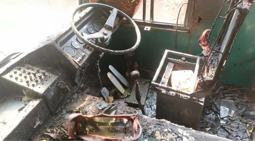 ### Fire in Bus in Jessore, Slum Dwellers Narrowly Escape In Jessore city, a bus parked near the Upashahar park was set on fire by miscreants. Quick action prevented a major disaster, and nearby slum dwellers narrowly escaped harm. The incident occurred early Thursday morning (November 13). Police visited the site after receiving the report. Locals said that after the Fajr prayer, they noticed smoke coming from inside the bus and rushed to the scene. Upon reaching, they found no one inside, but the fire was spreading rapidly. The slum residents worked together for nearly 20 minutes to bring the fire under control. The bus supervisor, **Hannan Khan** from Shreepur, Magura, said the bus named **“Rahin Special”** operates regularly on the Jessore-Magura route. Like every night, the bus was parked in the Upashahar area. He added, “I spent the night inside the bus. When I returned home in the morning, I learned that miscreants had set it on fire. The seats and some parts of the bus were burned, but the engine remained intact.” Locals pointed out that if the fire had spread to the nearby Upashahar slum, many houses could have been destroyed instantly. Their prompt action helped prevent a major disaster. Jessore Kotwali Police Inspector (Investigation) **Kazi Babul Islam** said, “Preliminary investigation suggests that the fire was started by breaking the window next to the driver’s seat.” He added, “At the time of the incident, the night guard had gone to a nearby shop for tea, and the supervisor was on his way home.” He further stated that the case is under investigation, and the police have already started efforts to identify the perpetrators.